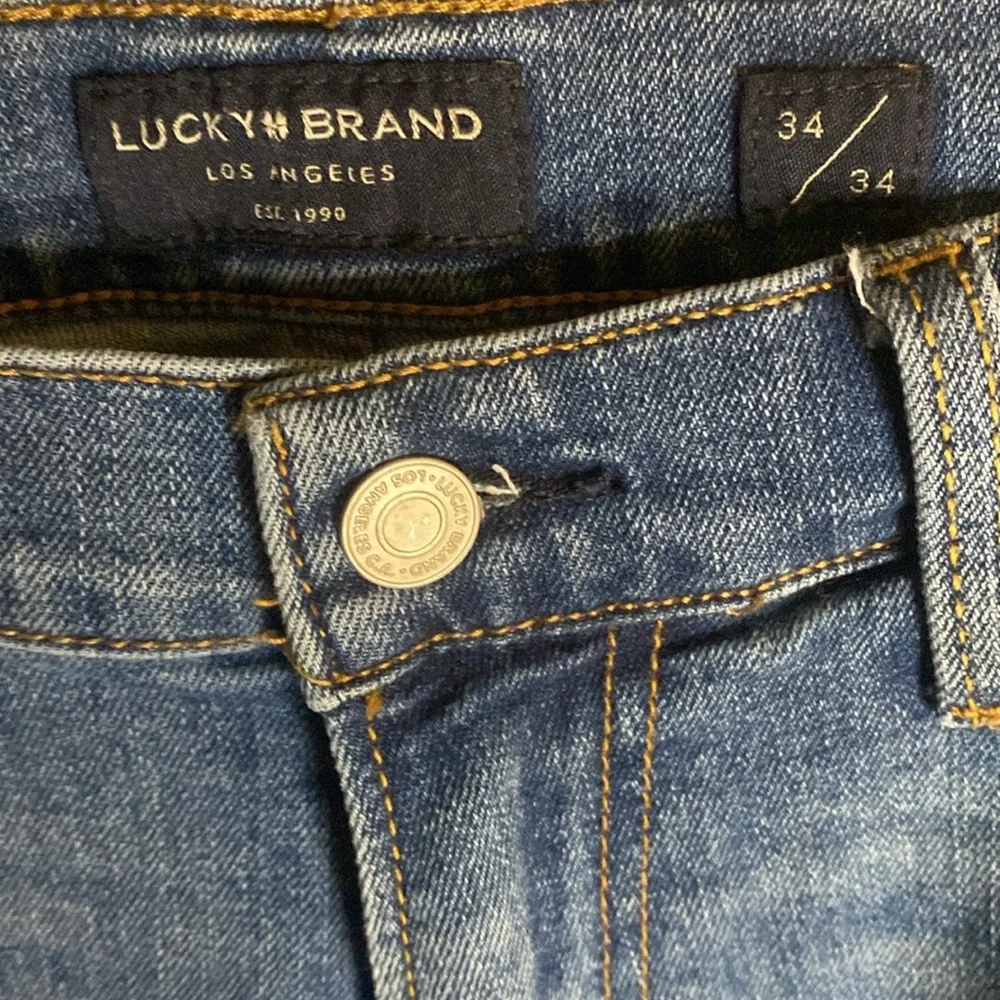 Lucky Brand 410 Athletic Slim jeans size 34x34 cuffs slit for boots